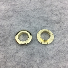Eyelet with washer